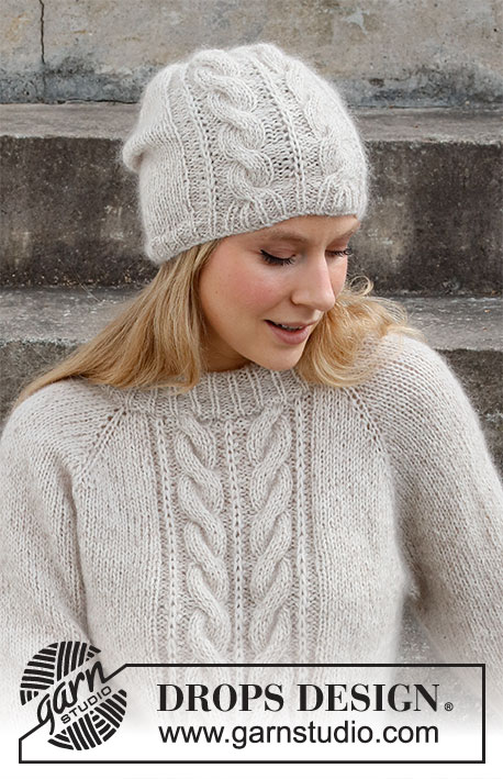 Herringbone Hill / DROPS 215-4 - Jersey a punto en DROPS Sky y DROPS Kid-Silk. La labor está realizada de arriba abajo con raglán, trenzas y puntos en punto inglés. Talla S - XXXL.
Gorro a punto en DROPS Sky y DROPS Kid-Silk, con trenzas y puntos en punto inglés.