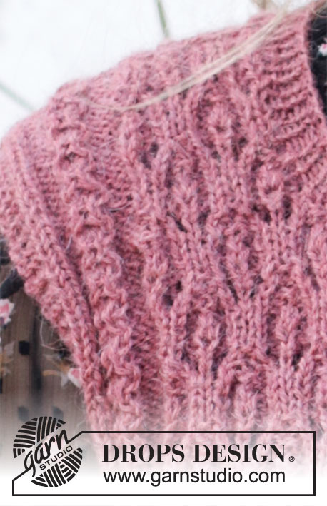 Raspberry Rose / DROPS 218-17 - Knitted vest / slipover in DROPS Alpaca. The piece is worked with lace pattern, small cables and round neck. Sizes S - XXXL.