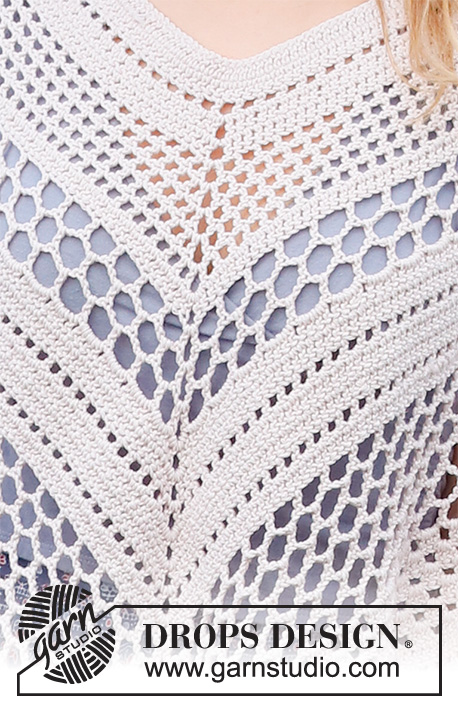 Bee Made / DROPS 220-23 - Crocheted poncho in DROPS Cotton Merino. The piece is worked top down, with lace pattern. Sizes S - XXXL.