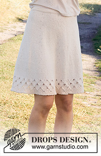 Swing by Spring Skirt / DROPS 220-32 - Falda a punto en DROPS Belle. La labor está realizada de arriba abajo con el patrón de calados y el patrón de hojas. Talla: S - XXXL