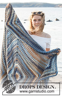 Gift of the tide / DROPS 221-28 - Crocheted blanket with granny square in 1 strand DROPS Big Delight or 2 strands DROPS Delight. The piece is worked from the middle outwards.