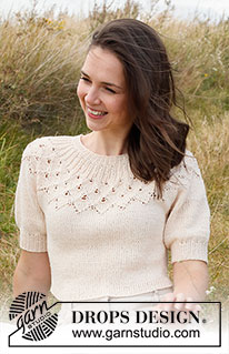 Swing by Spring Top / DROPS 222-32 - Pulovr s kruhovým sedlem, listovým ažurovým vzorem a krátkými balonovými rukávy pletený shora dolů z příze DROPS Belle. Velikost: S - XXXL