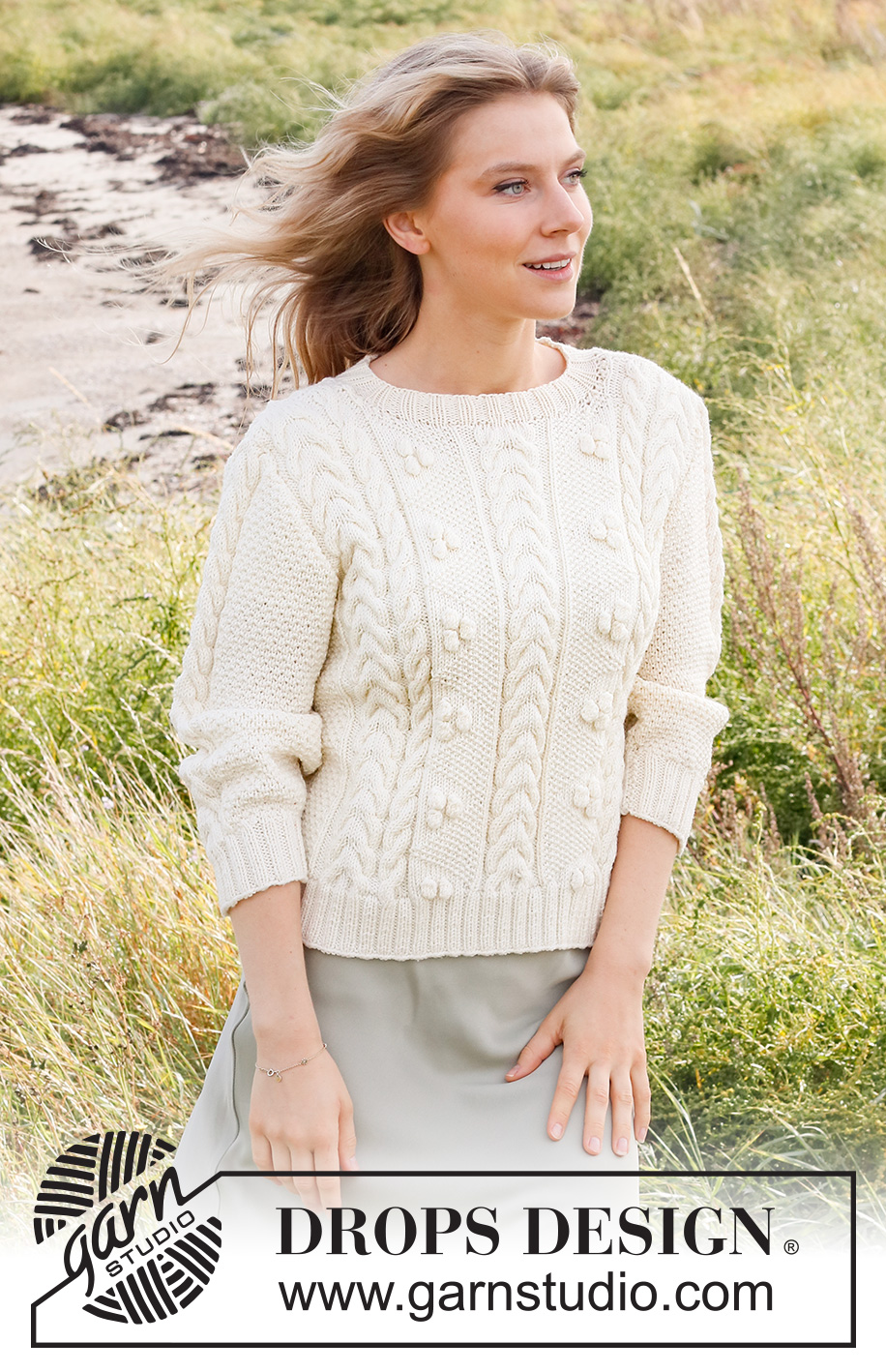 Bright Sand Shore / DROPS 222-35 - Strikket genser i DROPS Merino Extra Fine. Arbeidet strikkes med fletter, bobler og ¾ lange ermer. Størrelse S - XXXL.