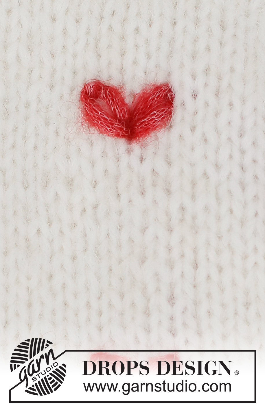 Fluttering Hearts / DROPS 222-49 - Broderet hjerte i DROPS Air. Hjertet er broderet med kædesting.
Tema: Broderi
