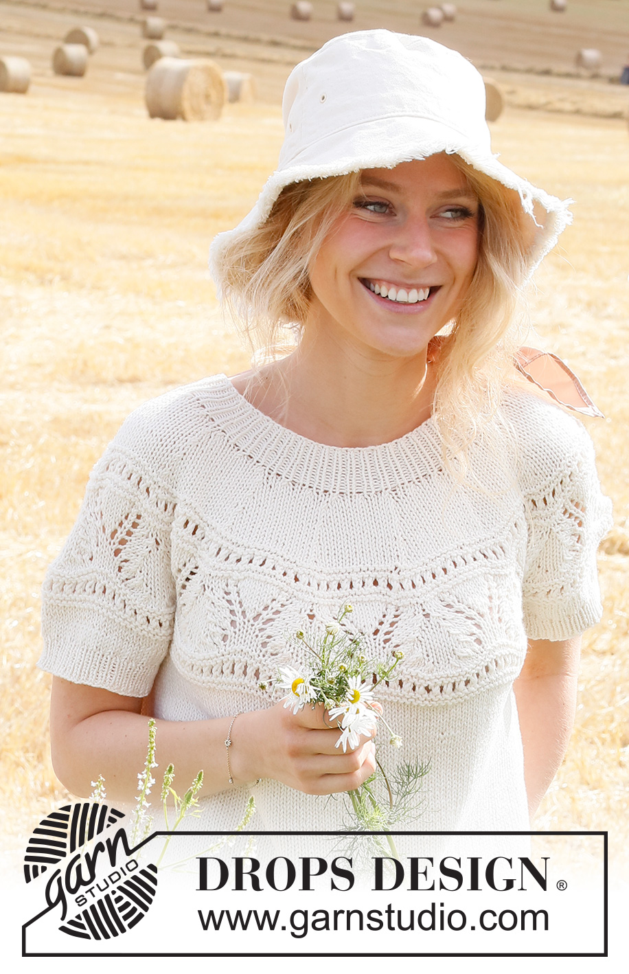 White Moon Top / DROPS 223-13 - Strikket bluse med korte ærmer i DROPS Cotton Merino eller DROPS Merino Extra Fine. Arbejdet strikkes i glatstrik med rundt bærestykke, hulmønster på bærestykket og kanter i rib. Størrelse XS - XXL.
