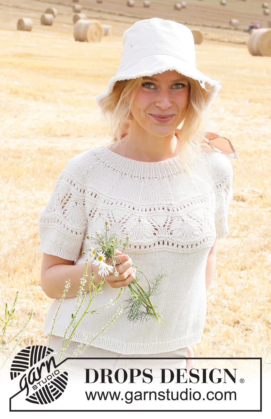 White Moon Top / DROPS 223-13 - Strikket bluse med korte ærmer i DROPS Cotton Merino eller DROPS Merino Extra Fine. Arbejdet strikkes i glatstrik med rundt bærestykke, hulmønster på bærestykket og kanter i rib. Størrelse XS - XXL.
