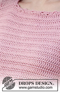 Pink Petunias / DROPS 223-35 - Crocheted top in DROPS Muskat. Piece is crocheted top down with vent mid back of neck and short pouffe sleeves. Size XS–XXL.