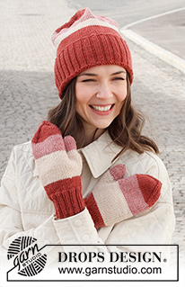 Christmas Frosting / DROPS 225-23 - Knitted hat and mittens in DROPS Lima. The piece is worked in stocking stitch with block-stripes and ribbed edges.