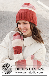 Christmas Frosting / DROPS 225-23 - Knitted hat and mittens in DROPS Lima. The piece is worked in stocking stitch with block-stripes and ribbed edges.