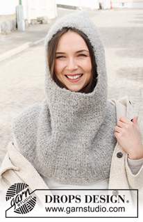 Polar Play / DROPS 225-26 - Knitted hat / Balaclava in DROPS Alpaca Bouclé and DROPS Brushed Alpaca Silk. Piece is knitted top down with textured pattern.