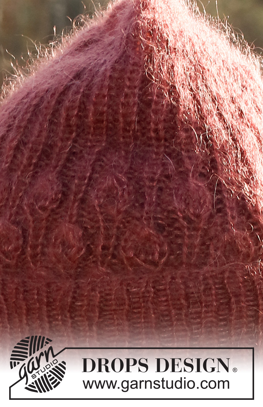 Cranberry Charmer / DROPS 226-48 - Knitted hat in 2 strands DROPS Kid-Silk or 1 strand DROPS Brushed Alpaca Silk. Piece is knitted bottom up with rib and leaf pattern.