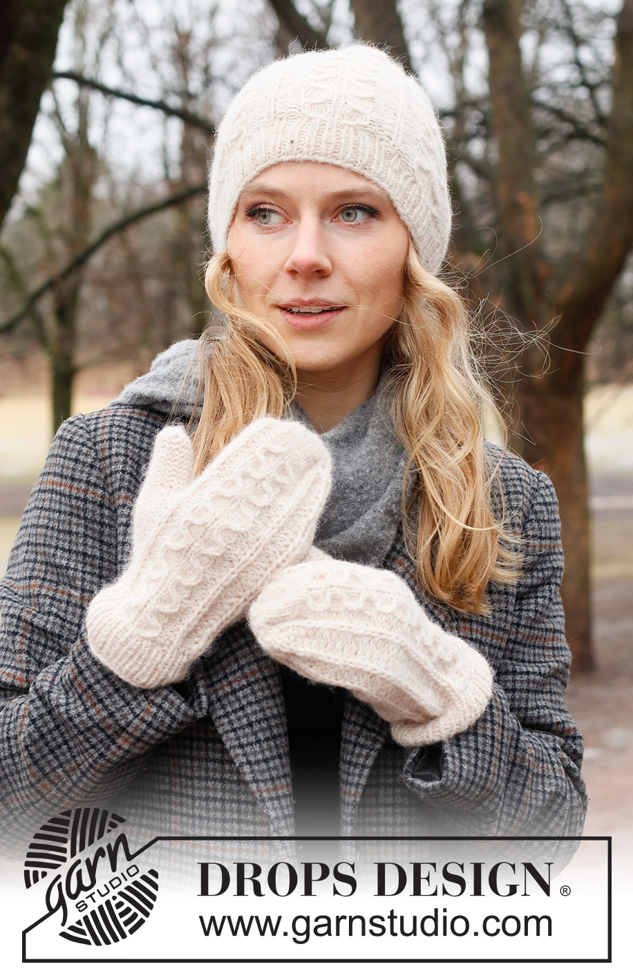 Rolling Snow Set / DROPS 226-53 - Knitted hat and mittens in DROPS Air. The piece is worked with cables and Fisherman’s rib.
