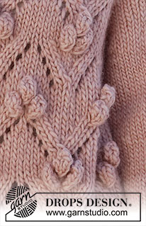 Rosé Bubbles Jacket / DROPS 227-23 - Knitted jacket in DROPS Snow or DROPS Wish. The piece is worked top down with raglan and lace pattern. Sizes S - XXXL.