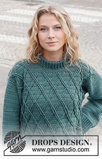 Teal Crossover Sweater / DROPS 227-29 - Hæklet bluse i DROPS Merino Extra Fine. Arbejdet hækles med snoninger, reliefmønster og dobbelt halskant. Størrelse S - XXXL.