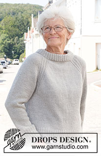 Misty Moon Sweater / DROPS 228-16 - Strikket bluse i DROPS Merino Extra Fine eller DROPS Puna. Arbejdet strikkes oppefra og ned med dobbelt halskant, raglan og kanter i strukturmønster. Størrelse S - XXXL.