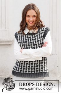 Cambridge Connection / DROPS 228-36 - Knitted vest in DROPS Alaska. Piece is knitted with pepita pattern and edges in rib. Size: S - XXXL