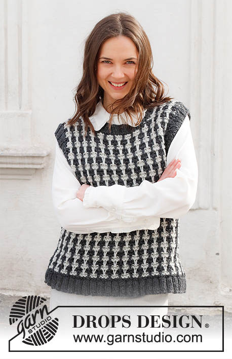 Cambridge Connection / DROPS 228-36 - Knitted vest in DROPS Alaska. Piece is knitted with pepita pattern and edges in rib. Size: S - XXXL