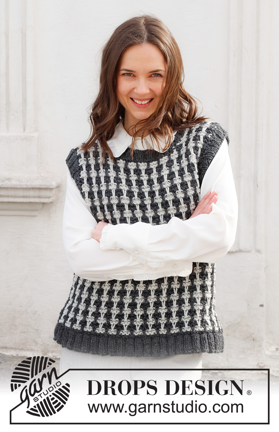 Cambridge Connection / DROPS 228-36 - Knitted vest in DROPS Alaska. Piece is knitted with pepita pattern and edges in rib. Size: S - XXXL