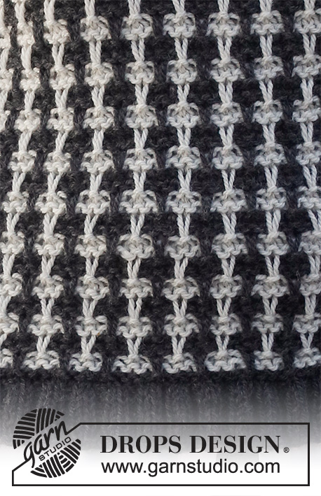 Cambridge Connection / DROPS 228-36 - Knitted vest in DROPS Alaska. Piece is knitted with pepita pattern and edges in rib. Size: S - XXXL