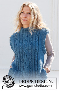 December Tide Vest / DROPS 228-40 - Knitted vest in DROPS Flora and DROPS Kid-Silk or DROPS Alpaca and DROPS Kid-Silk. The pieced is worked with cables, double neck and split in the slides. Sizes S - XXXL.