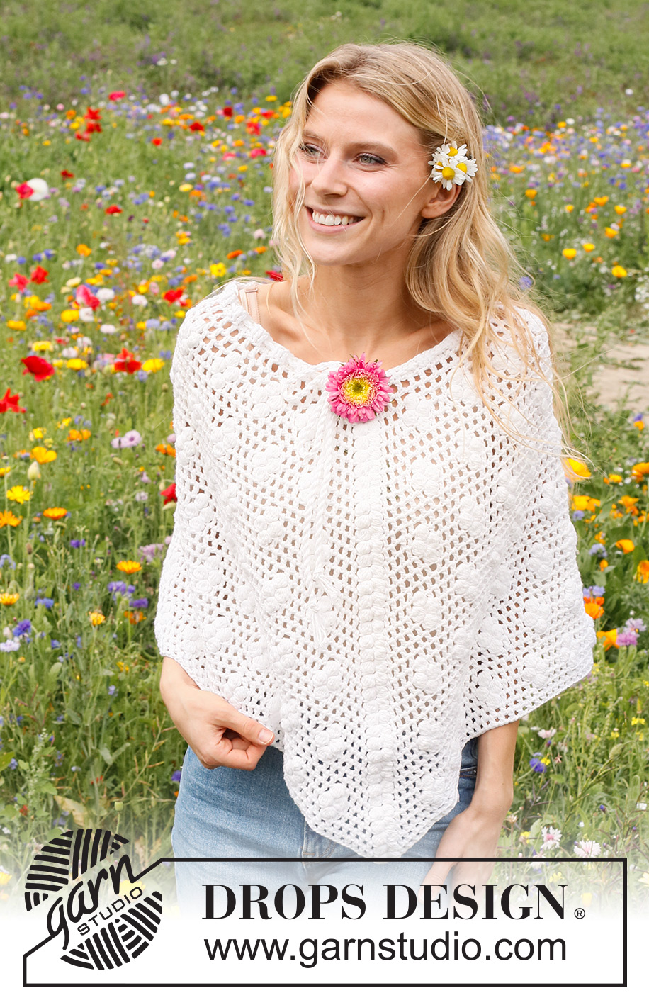 Daisy Droplets / DROPS 229-16 - Crocheted poncho in DROPS Cotton Merino. The piece is worked top down with lace pattern and bobbles. Sizes S - XXXL.