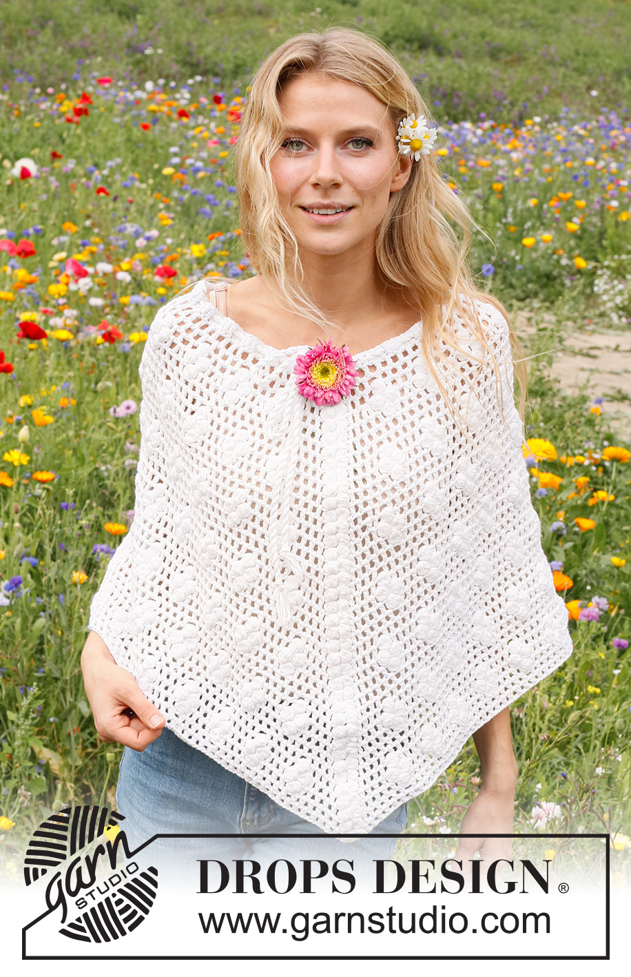 Daisy Droplets / DROPS 229-16 - Crocheted poncho in DROPS Cotton Merino. The piece is worked top down with lace pattern and bobbles. Sizes S - XXXL.