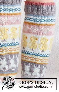 Easter Dance Socks / DROPS 229-35 - Knitted socks in DROPS Karisma. The piece is worked top down in stocking stitch, with multi-coloured pattern and heart, Easter chick, Easter bunny and flower. Sizes 35 - 43. Theme: Easter.