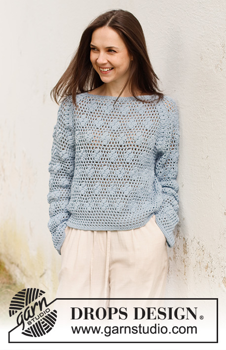 Cloud Catcher / DROPS 230-32 - Virkad tröja i DROPS Cotton Merino. Arbetet virkas uppifrån och ner med raglan, hålmönster, muscher och solfjädersmönster. Storlek S - XXXL.
