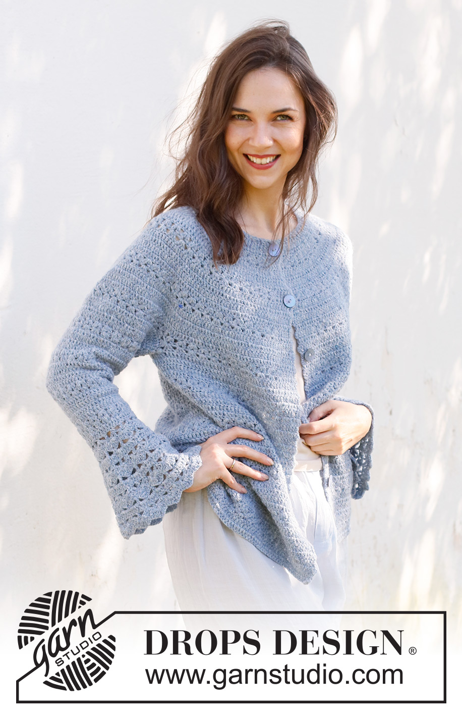 Spring Renaissance Cardigan / DROPS 230-38 - Crocheted jacket in DROPS Sky. The piece is worked top down with round yoke, lace and fan pattern and trumpet sleeves. Sizes S - XXXL.
