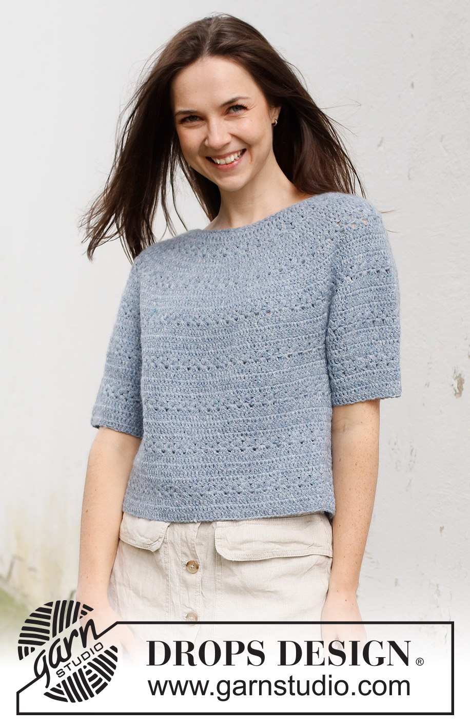 Spring Renaissance Top / DROPS 230-40 - Crocheted jumper with short sleeves / t-shirt in DROPS Sky. Piece is crocheted top down with round yoke and lace pattern. Size: S - XXXL