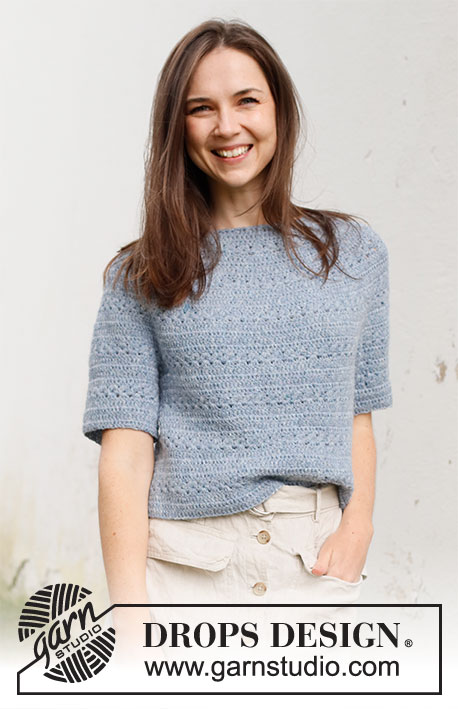 Spring Renaissance Top / DROPS 230-40 - Crocheted jumper with short sleeves / t-shirt in DROPS Sky. Piece is crocheted top down with round yoke and lace pattern. Size: S - XXXL