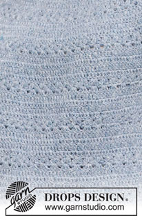 Spring Renaissance Top / DROPS 230-40 - Crocheted jumper with short sleeves / t-shirt in DROPS Sky. Piece is crocheted top down with round yoke and lace pattern. Size: S - XXXL
