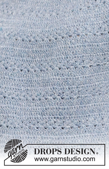 Spring Renaissance Top / DROPS 230-40 - Crocheted jumper with short sleeves / t-shirt in DROPS Sky. Piece is crocheted top down with round yoke and lace pattern. Size: S - XXXL
