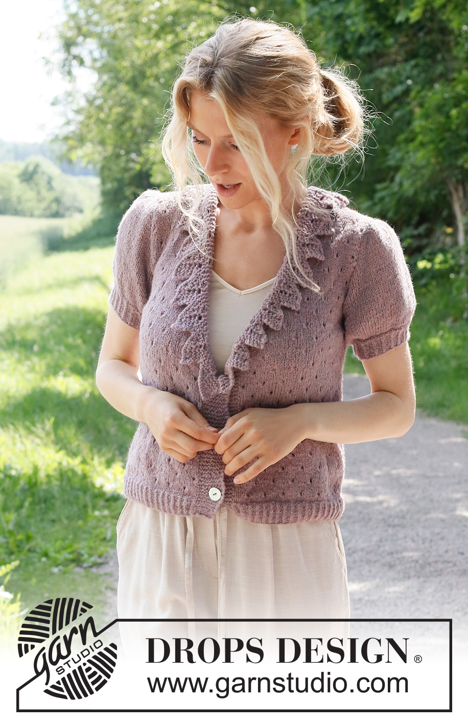 Fairy Woods Cardigan / DROPS 231-14 - Stickad kofta i DROPS Sky. Arbetet stickas nedifrån och upp, med hålmönster,  volangkant och korta ärmar. Storlek S - XXXL.