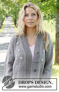 Shy Daisy Cardigan / DROPS 231-33 - Strikket jakke i DROPS Merino Extra Fine. Arbeidet strikkes nedenfra og opp i glattstrikk og broderte blomster. Størrelse S - XXXL.