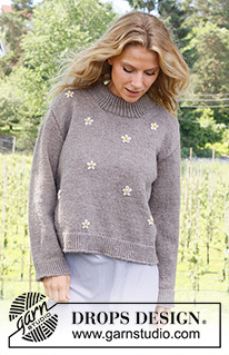 Shy Daisy / DROPS 231-34 - Gebreide trui in DROPS Merino Extra Fine. Het werk wordt van onder naar boven gebreid met dubbele halsrand en geborduurde bloemen. Maat: S - XXXL