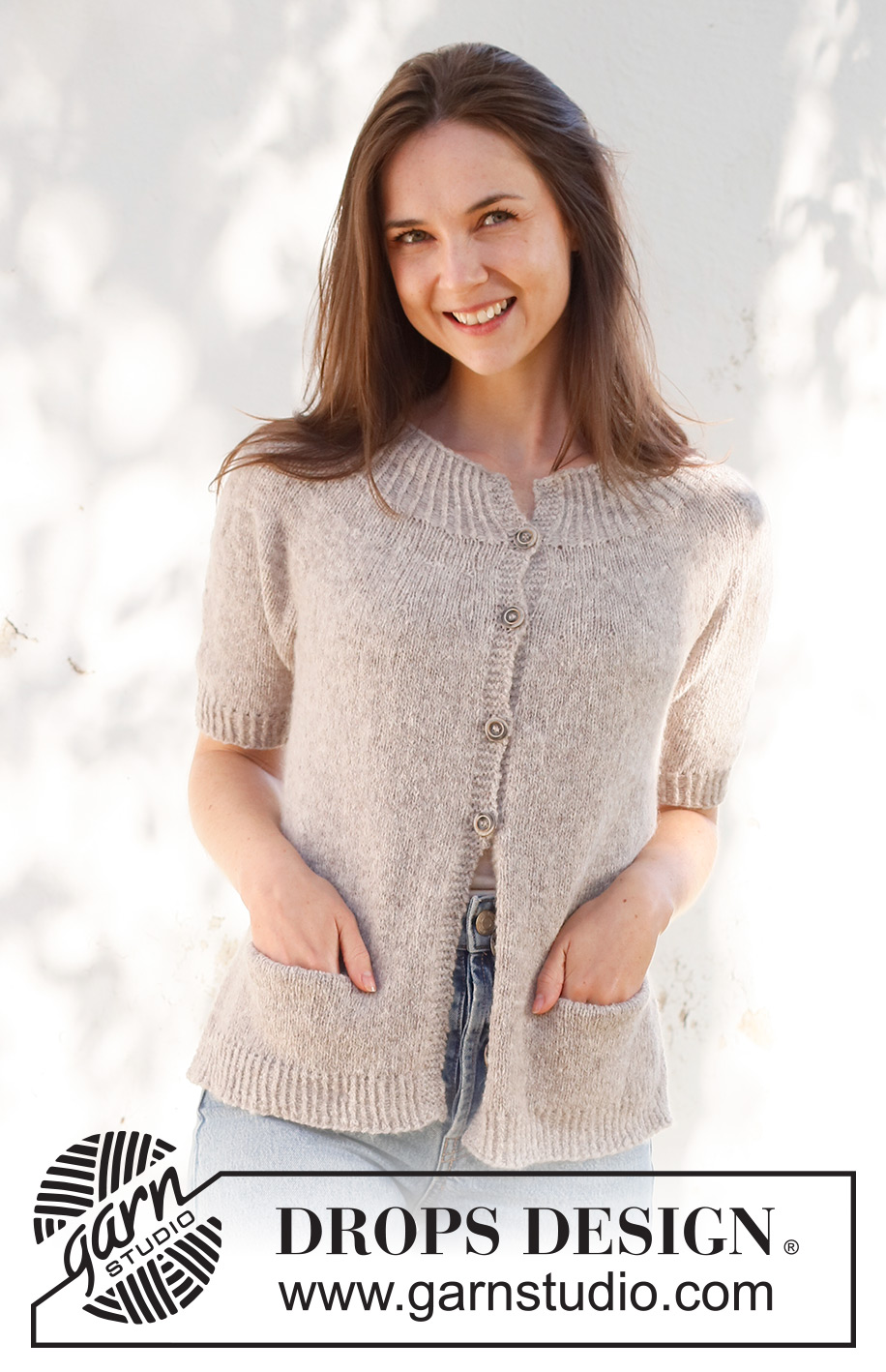 Daisy Lane Cardigan / DROPS 231-54 - Knitted jacket in DROPS Sky. Piece is knitted top down with round yoke, stockinette stitch, pockets, short sleeves and vents in the sides. Size XS – XXL.