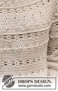 Sand Castle / DROPS 232-40 - Virkad tröja i DROPS Cotton Light. Arbetet virkas uppifrån och ner med runt ok, solfjädersmönster och muscher. Storlek S - XXXL.