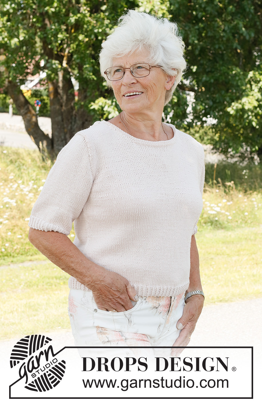 Evening Walk Top / DROPS 232-47 - Knitted sweater in DROPS Cotton Merino. The piece is worked bottom up in stockinette stitch with short sleeves. Sizes S - XXXL.