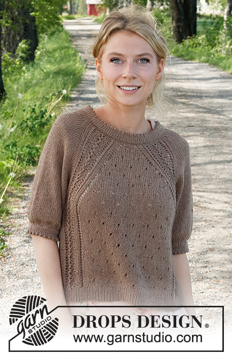 New Land / DROPS 232-9 - Strikket bluse i DROPS Belle. Arbejdet strikkes oppefra og ned med raglan, hulmønster, dobbelt kanter og korte ærmer. Størrelse S - XXXL.