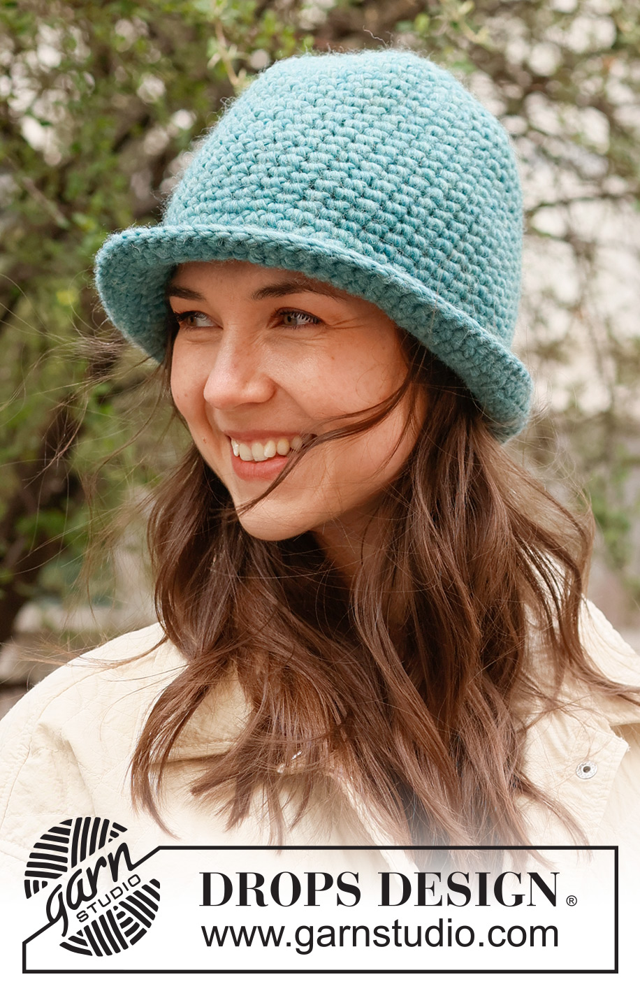 Forest Shade Hat / DROPS 234-16 - Crocheted hat in DROPS Snow. The piece is worked top down in double crochets. Sizes S - L.