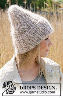 Frosted Charm / DROPS 234-39 - Gebreide muts in 1 draad DROPS Soft-Tweed en 2 draden DROPS Kid-Silk. Het werk is wordt van onder naar boven gebreid in boordsteek.
