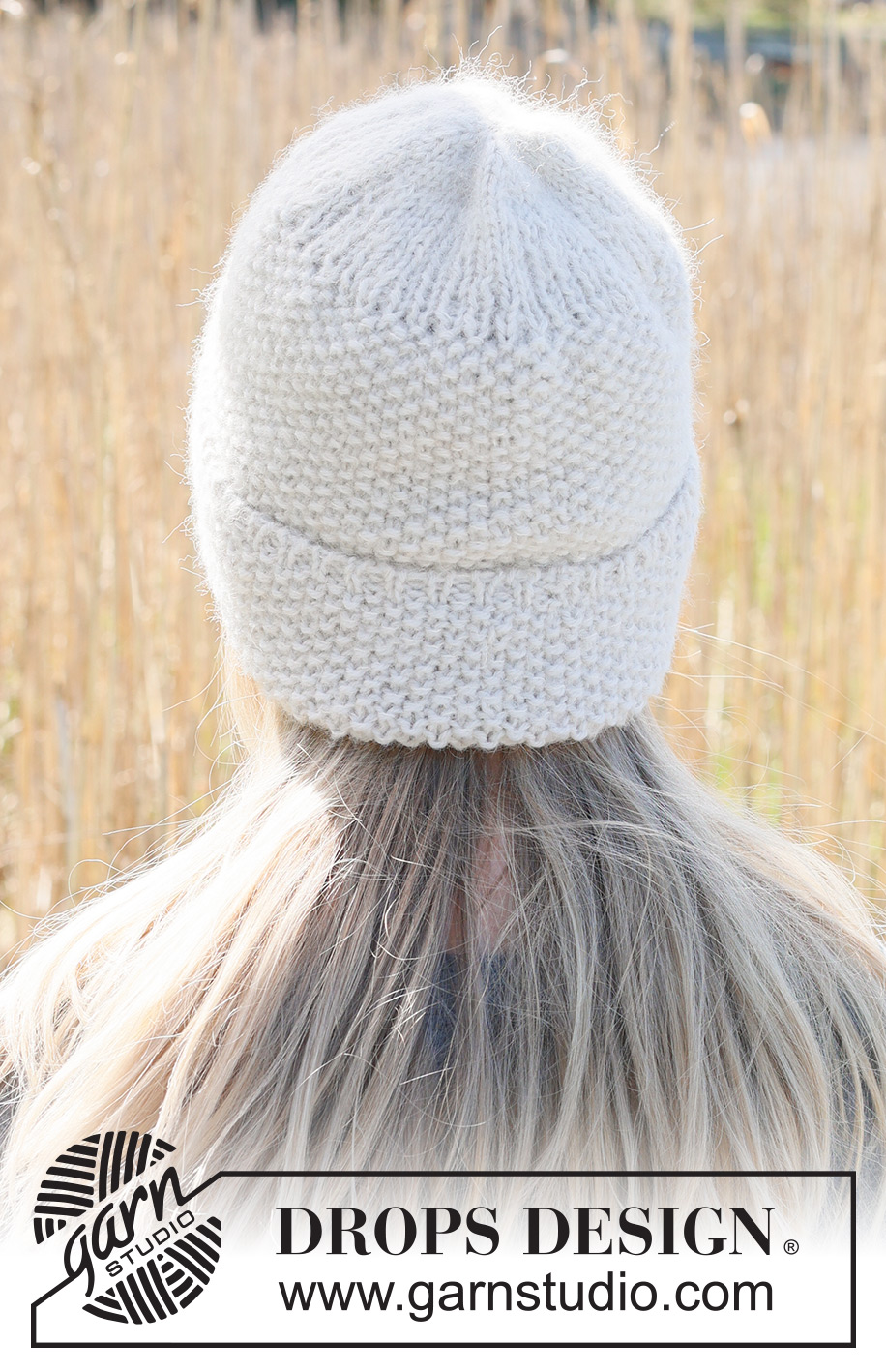 Lovebird / DROPS 234-44 - Knitted hat in DROPS Lima and DROPS Brushed Alpaca Silk. Piece is knitted bottom up in moss stitch.