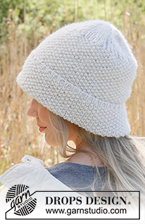 Lovebird / DROPS 234-44 - Knitted hat in DROPS Lima and DROPS Brushed Alpaca Silk. Piece is knitted bottom up in moss stitch.