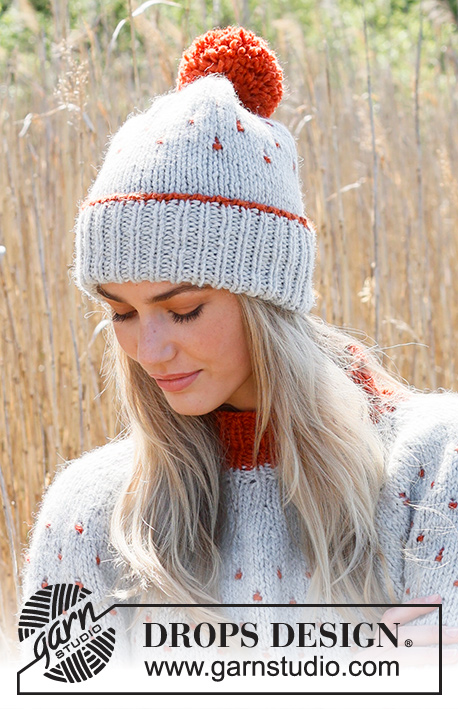 Cranberry Splash Hat / DROPS 234-45 - Knitted hat in DROPS Andes. Piece is knitted top down with edge in rib, multi-colored pattern and pompom.
