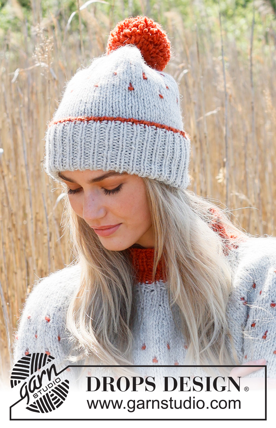 Cranberry Splash Hat / DROPS 234-45 - Knitted hat in DROPS Andes. Piece is knitted top down with edge in rib, multi-colored pattern and pompom.