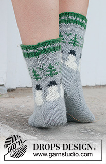Snowman Time Socks / DROPS 234-64 - Knitted socks in DROPS Karisma. The piece is worked top down with coloured Christmas tree and snowman pattern. Sizes 35 – 43. Theme: Christmas.