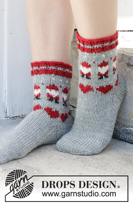 Santa Time Socks / DROPS 234-65 - Knitted socks in DROPS Karisma. The piece is worked top down with coloured Santa and heart-pattern. Sizes 35 – 43. Theme: Christmas.
