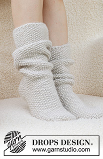 Snow White Socks / DROPS 234-73 - Skarpetki na drutach z włóczek DROPS Lima i DROPS Brushed Alpaca Silk. Przerabiane od góry do dołu, ściegiem ryżowym. Od 35 do 43. Temat: Boże Narodzenie.