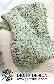Scent of Pines / DROPS 234-8 - Couverture crochetée au point zigzag avec nopes, avec 2 fils DROPS Wish ou 1 fil DROPS Polaris.